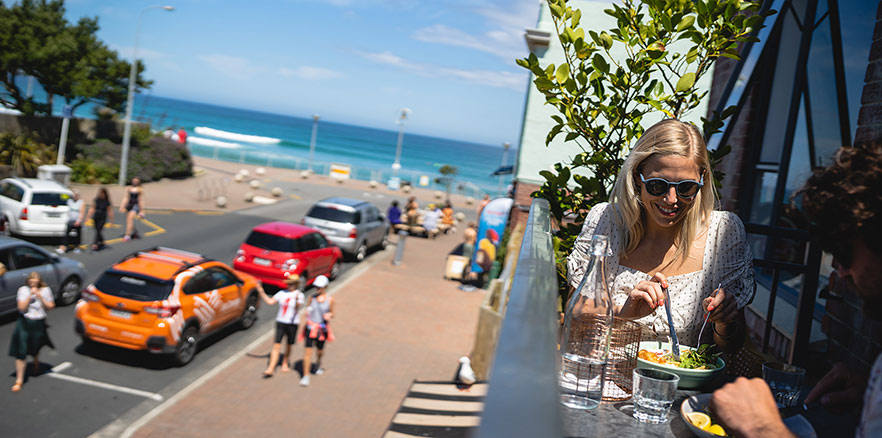 people-eating-on-the-balcony-of-starfish-cafe-at-saint-clair-photo-credit-dunedin-nz-737924.jpg People eating on the balcony of Starfish Cafe at Saint Clair. Photo credit: Dunedin NZ.