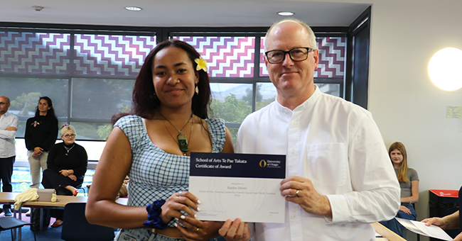 Kaylee Driver with Hugh Campbell receiving her award